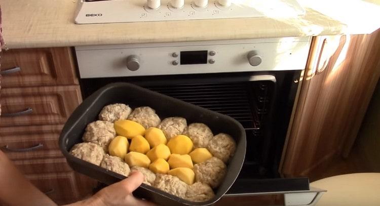 Put potatoes in the center of the pan and place the dish in the oven.
