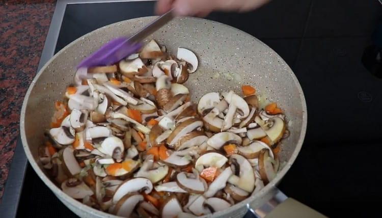 Then add mushrooms to the pan.