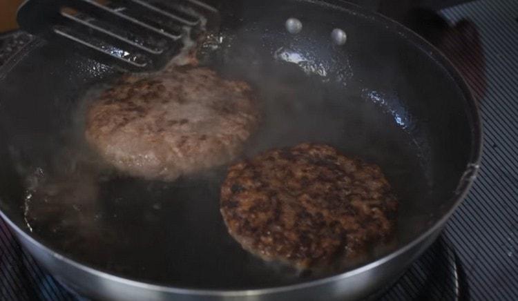 Fry the patties on both sides until golden brown.