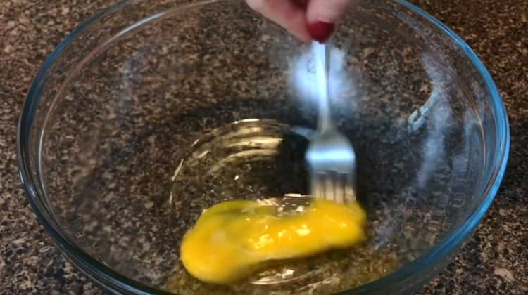 Beat the egg with a fork.