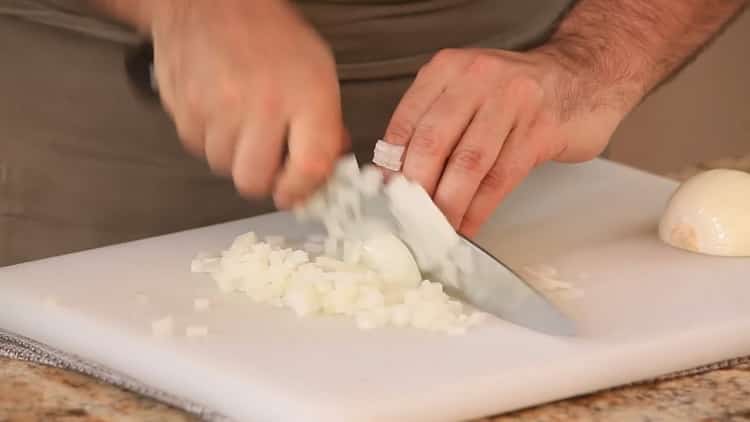 To make Tatar basics, chop the onion