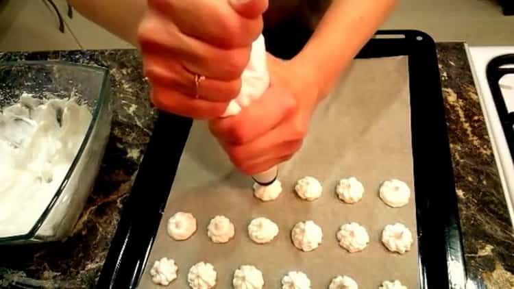 To prepare the meringues, prepare a baking sheet