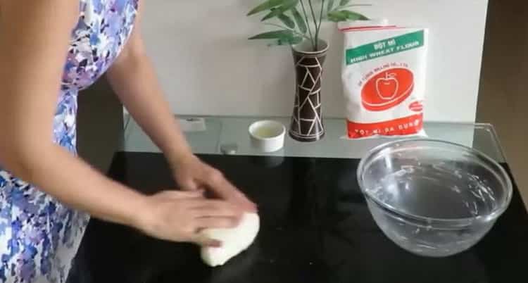 Knead the dough to make a bun