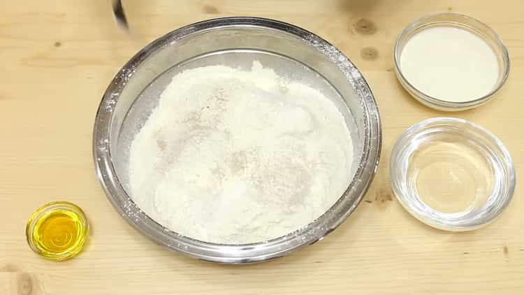 Add flour to prepare the dough.