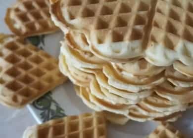 Waffles in a waffle iron according to a step-by-step recipe with a photo