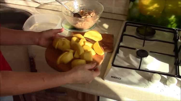 Chop potatoes for cooking