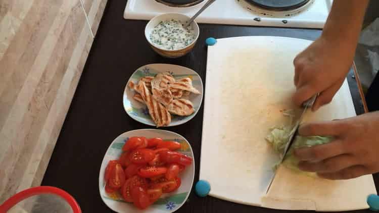 To cook shawarma, chop cabbage