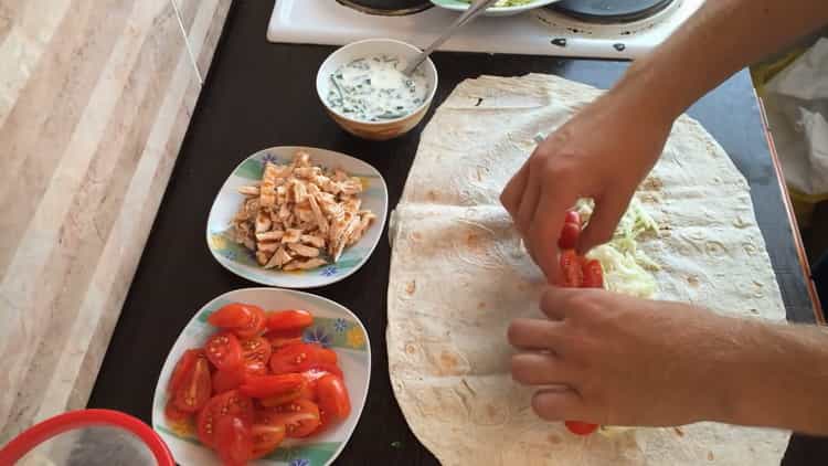 For the shawarma, put the tomatoes on a pita