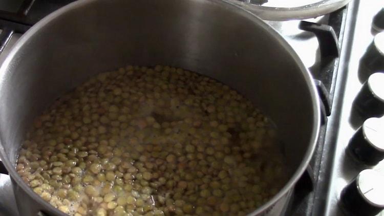 To prepare green lentils, put water on fire