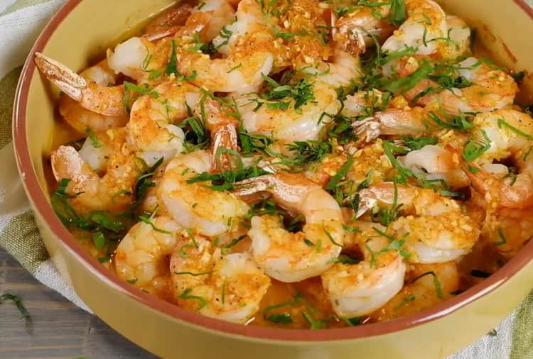 To cook shrimp in the oven, preheat the oven
