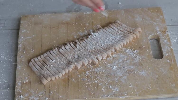 To make udon noodles, cut the dough