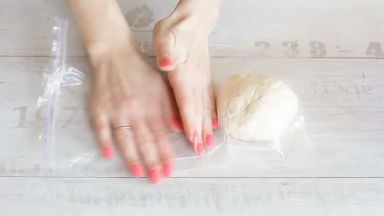 To make udon noodles, put the dough in a bag