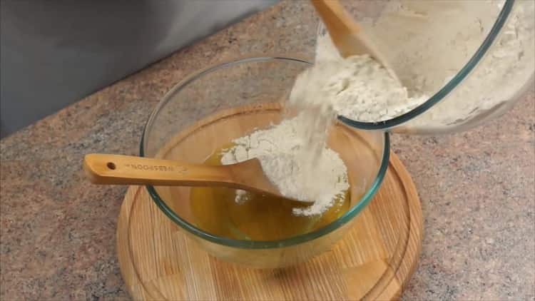 Combine flour and butter to prepare the dough.