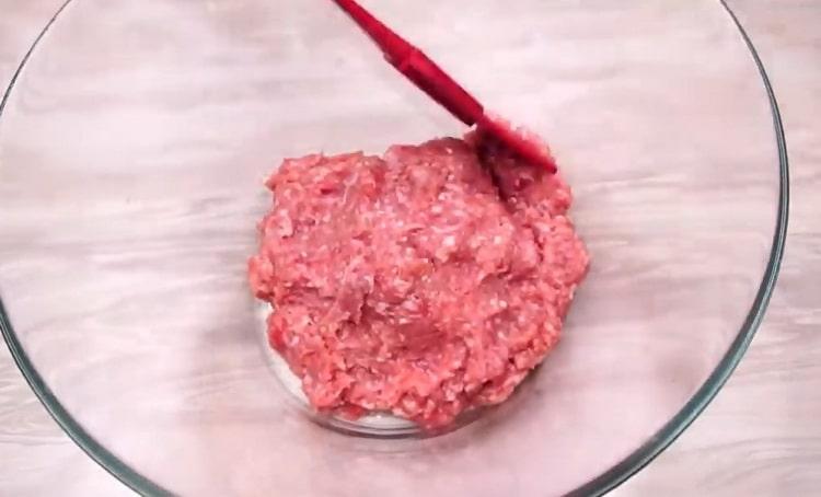 To make stuffed cabbage, cook minced meat