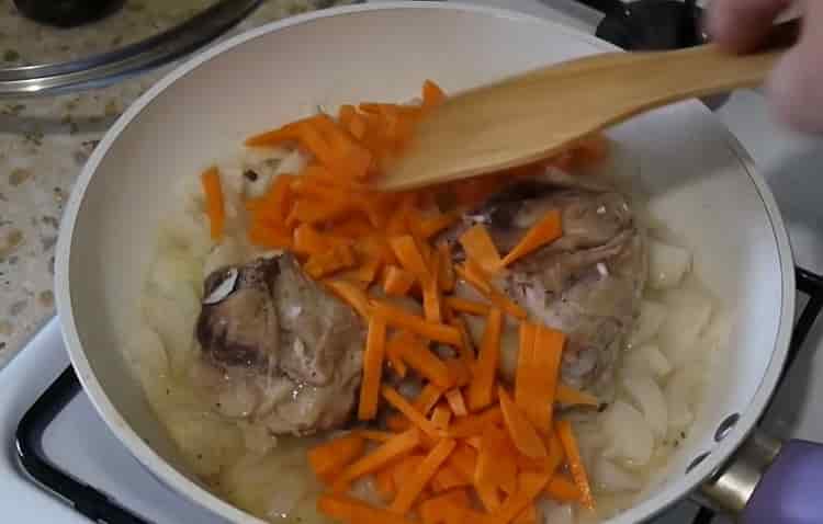 Fry carrots to make pearl barley with chicken