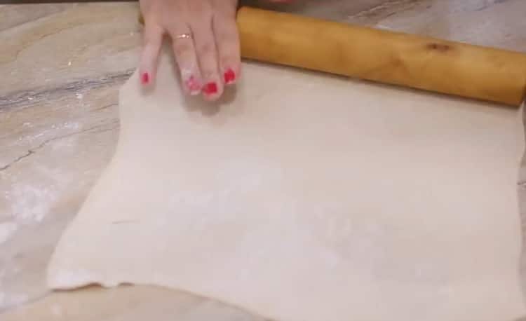 Roll out the dough to make a pie