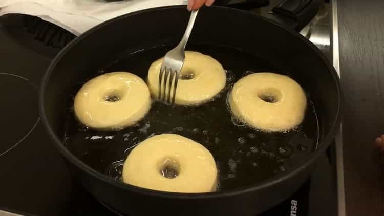 To cook American donuts, preheat the pan