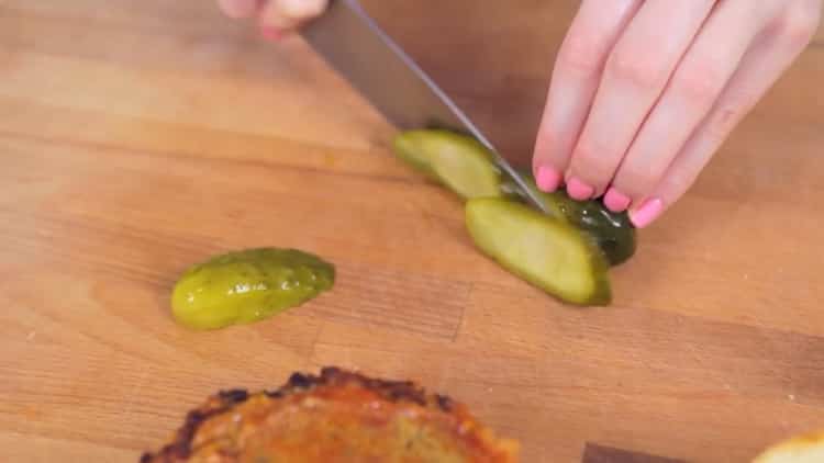 To cook a crabsburger, chop the cucumbers