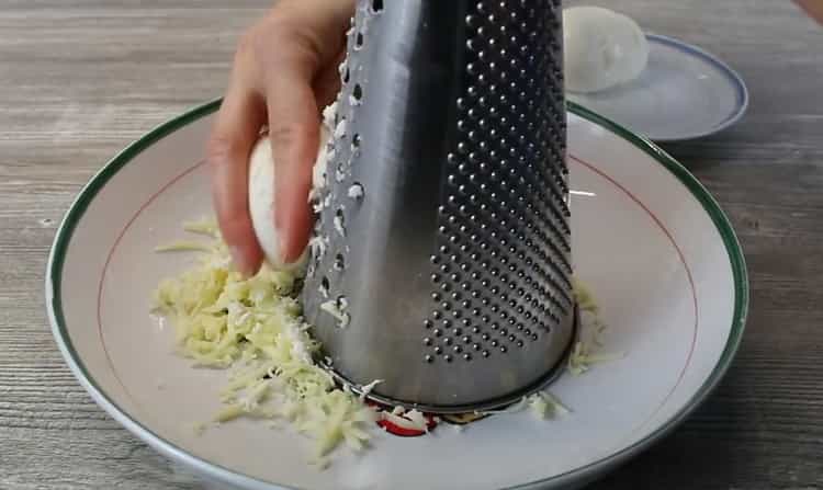 To make khachapuri, grate cheese