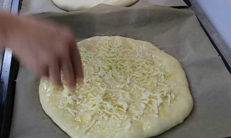 Khachapuri with cheese in the oven according to a step by step recipe with photo