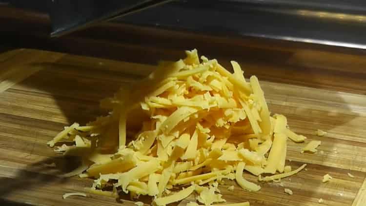 To cook rice with beans, grate cheese