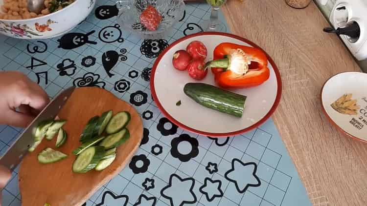 To make a salad, cut cucumbers