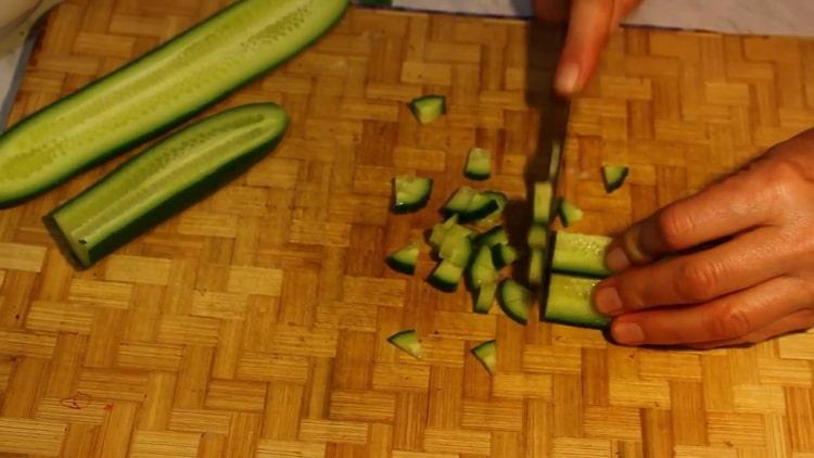 To make a salad, chop the cucumbers