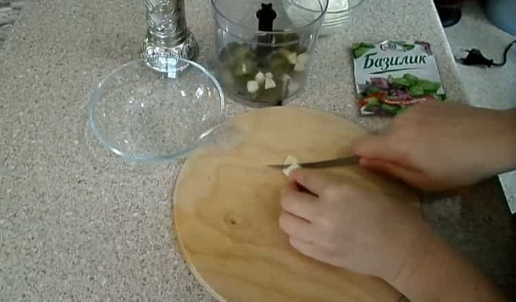 To prepare dressing, chop the garlic