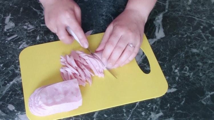 To cook the beans, chop the ham