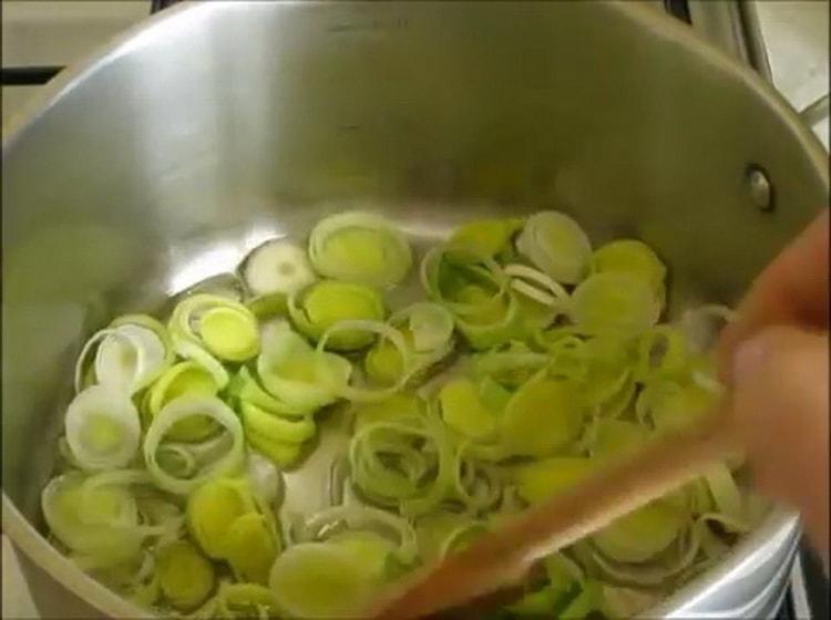 Fry the onion to make the soup.