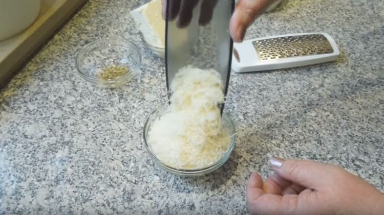 Rub the parmesan on a grater.