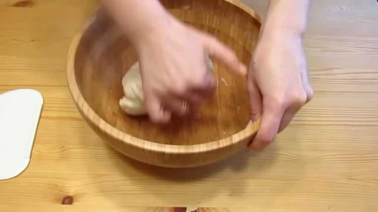 Mix the ingredients for the pizza dough.