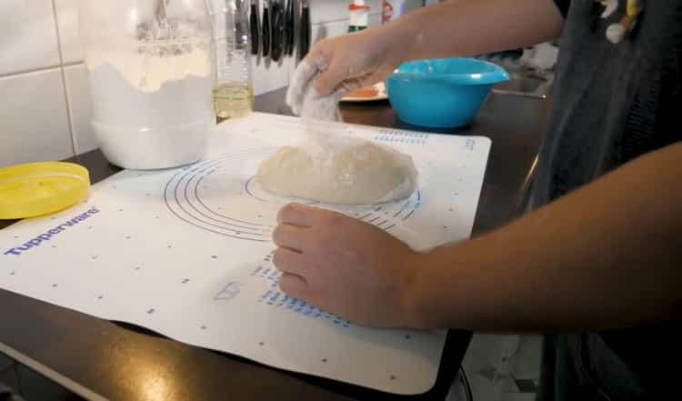 Place the ingredients on the table to prepare the dough.