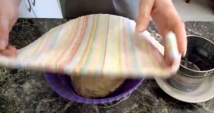 To prepare the dough, cover with a towel a bowl