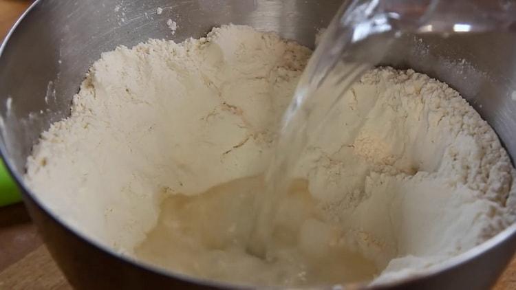 Add boiling water to prepare the dough.