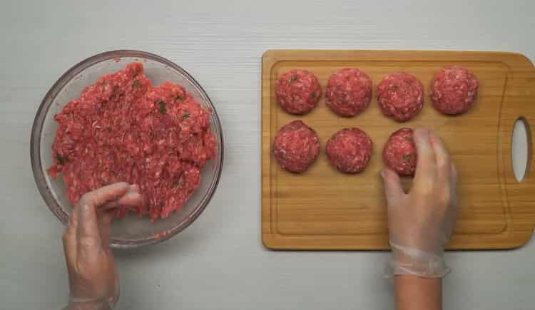 To cook meatballs lay meatballs on a board