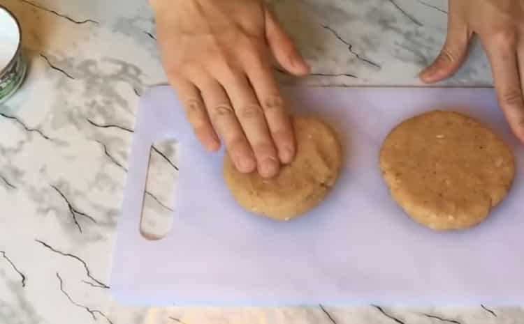 To make a chickenburger, cook cutlets