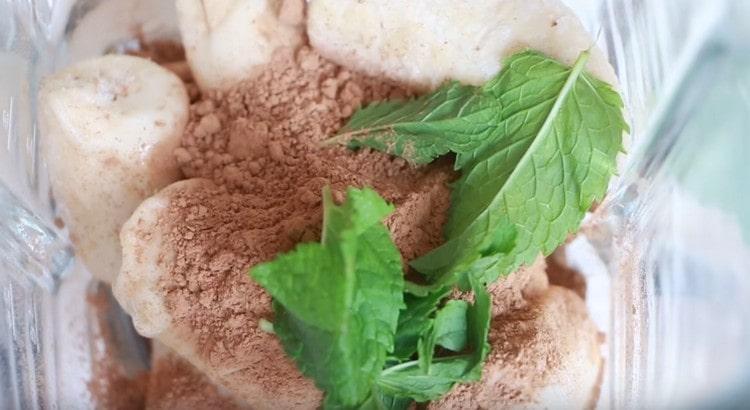 Put frozen bananas, cocoa, mint leaves, condensed milk in a blender bowl.