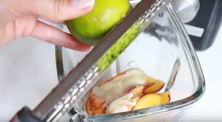 To the ingredient in the blender, rub the zest of lime.