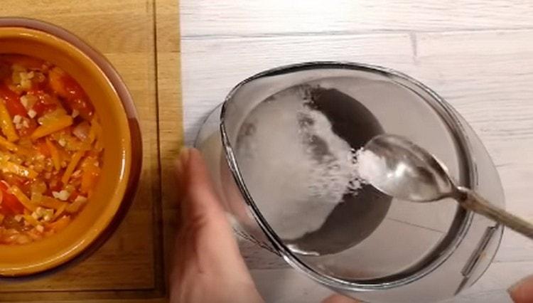 Dissolve salt in water.