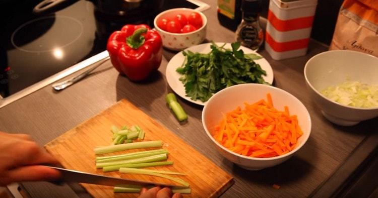 Cut the celery into strips.