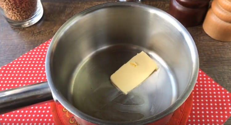 Put a piece of butter in a stewpan.