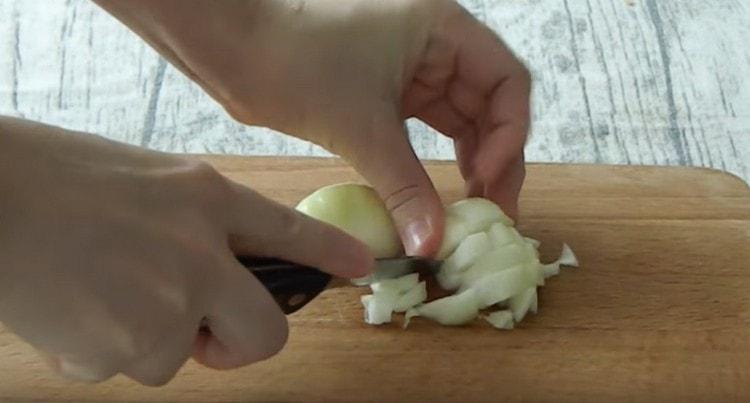 Finely chop the onion for the gravy.