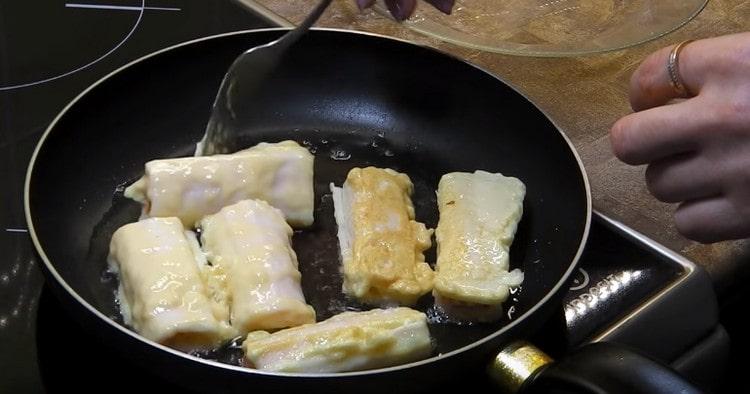 Fry the rolls on both sides until golden.