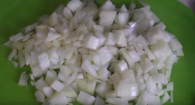 Cut the onion into a small dice.