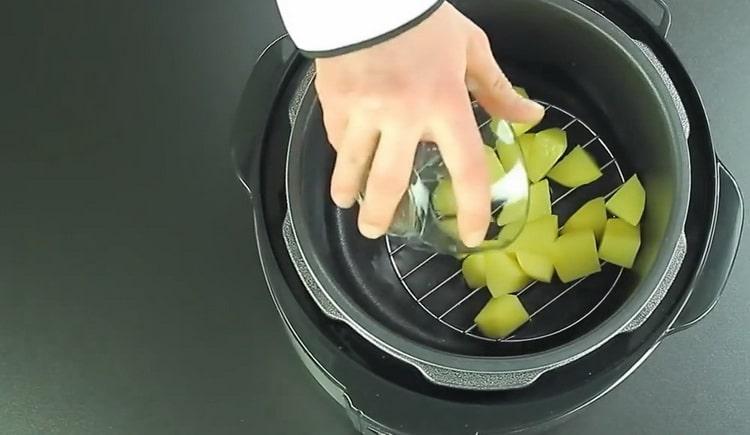 To cook steamed vegetables, chop the potatoes