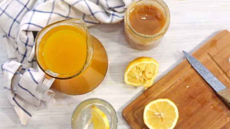 Drink from water with lemon and ginger according to a step by step recipe with photo