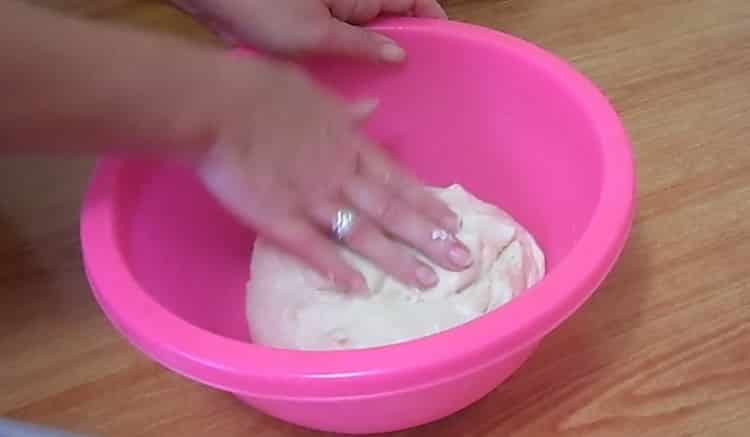 Knead the dough to make pies
