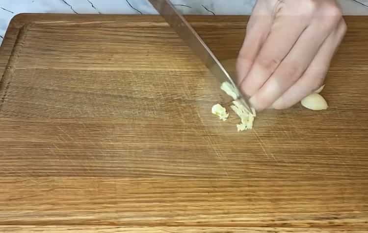 To make a salad, chop the garlic