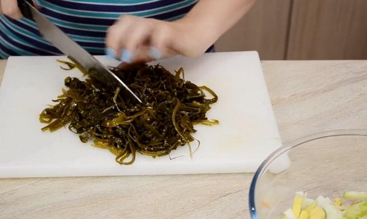 To make a salad, chop cabbage